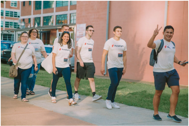Paradigm team members walking together outdoors